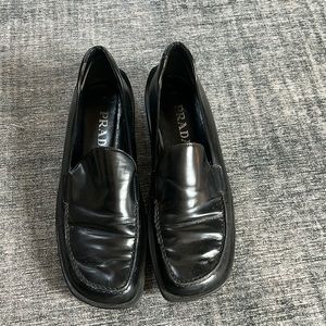 Women’s black leather Prada loafers. Size 38.5